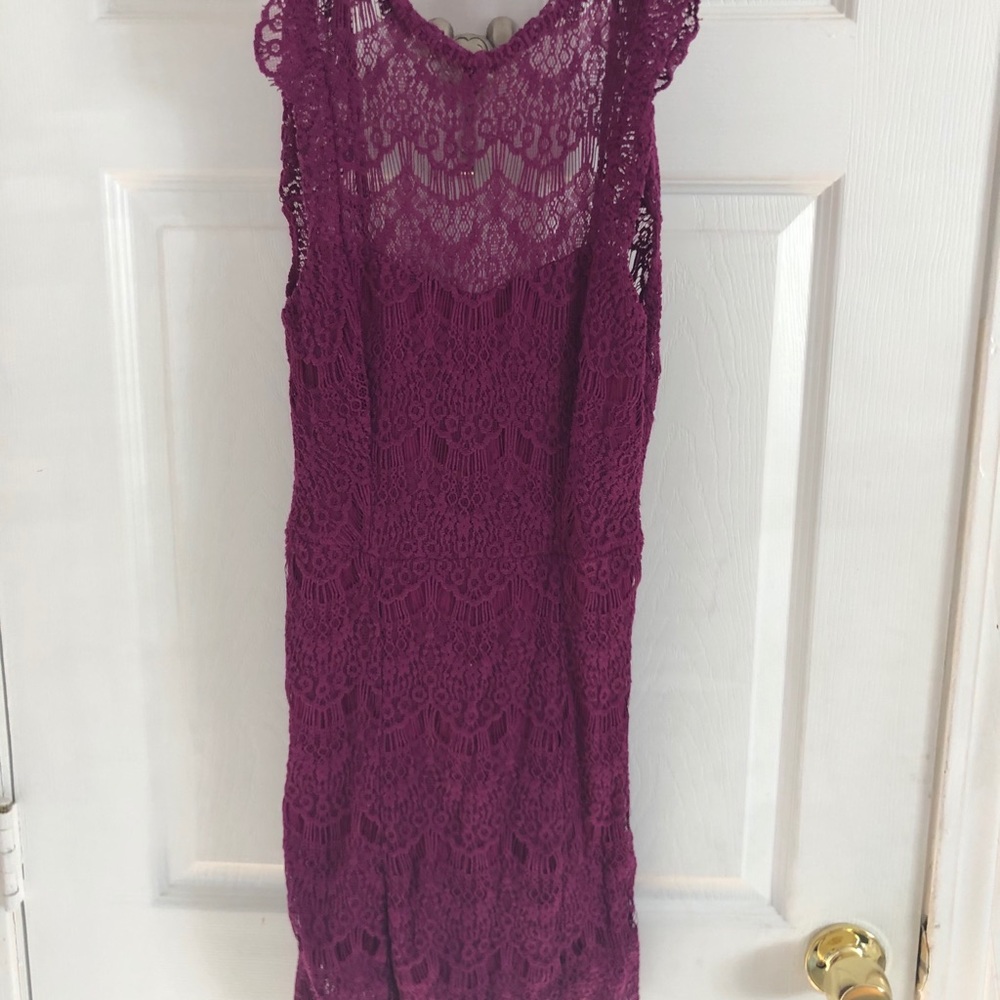 lace mini dress. Open keyhole low back opening.